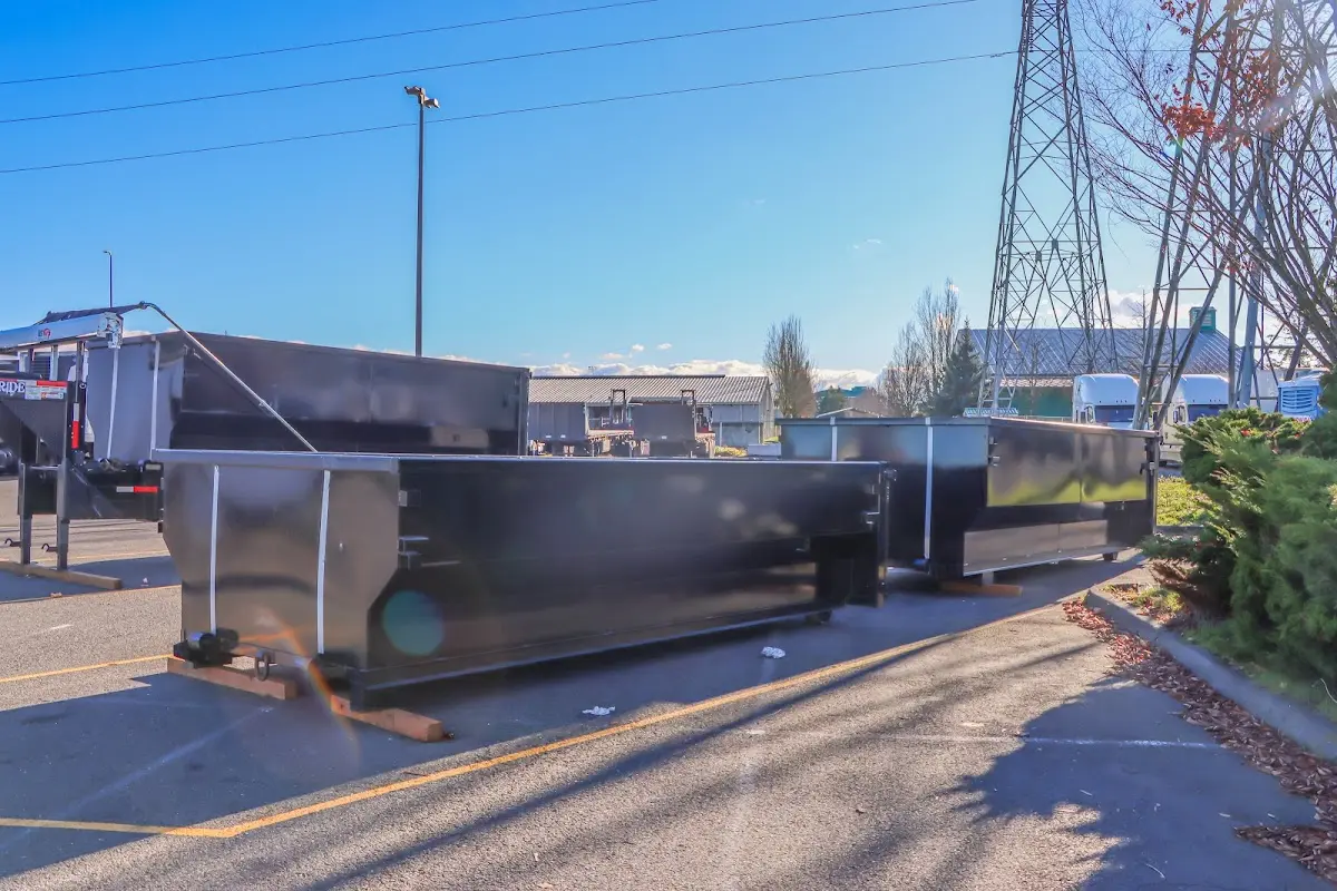 Roll-off dumpster ready for waste disposal at job site for Concrete Dumpster Rental in Lacy-Lakeview